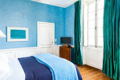 Un ou plusieurs lits dans un hébergement de l'établissement Chambres d'Hôtes Eden Ouest