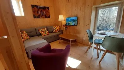 Télévision ou salle de divertissement dans l'établissement Gîte 2 personnes