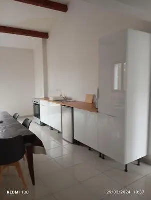 Cuisine ou kitchenette dans l'établissement LE VILLAGE DU PARC