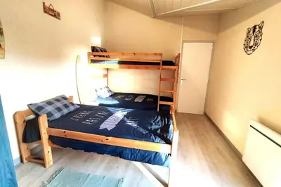 Un ou plusieurs lits dans un hébergement de l'établissement Gîte du Midi de Saint-Porchaire - Charmante maison de vacances avec piscine chauffée