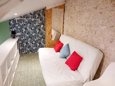 Un ou plusieurs lits dans un hébergement de l'établissement La Cure Marine Wifi Terrasse