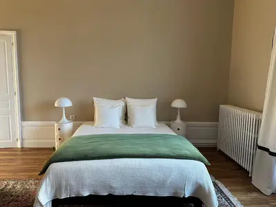 Un ou plusieurs lits dans un hébergement de l'établissement Château de Moulède