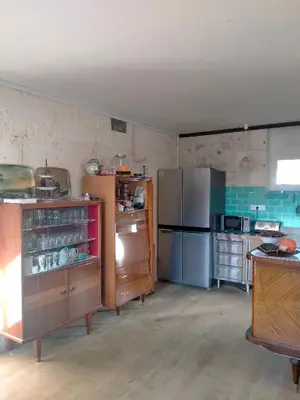 Cuisine ou kitchenette dans l'établissement L'oree du Bois - Chambres independante