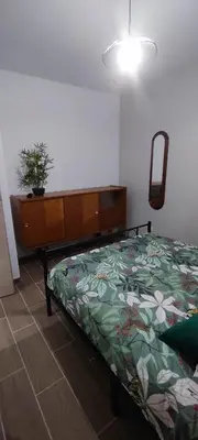 Un ou plusieurs lits dans un hébergement de l'établissement Charmante maison de plain-pied