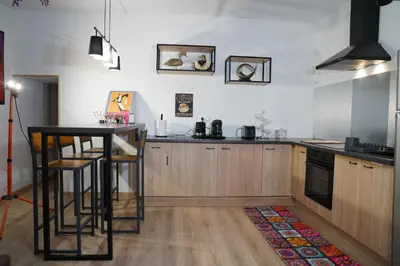 Cuisine ou kitchenette dans l'établissement la roseraie