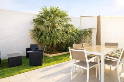 Jardin de l'établissement Appartement avec terrasse