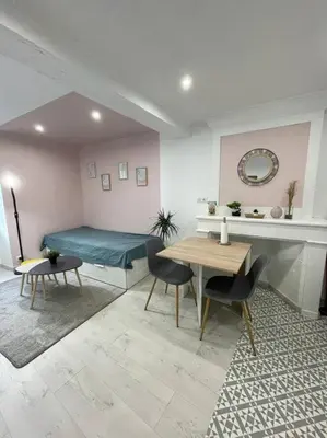 Coin salon dans l'établissement Joli studio Cozy tout équipé Hyper Centre Saintes
