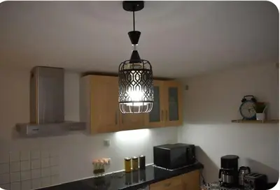 Cuisine ou kitchenette dans l'établissement Joli apartment proche du centre-ville