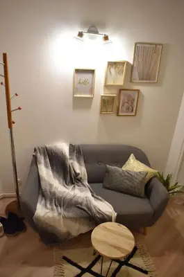 Coin salon dans l'établissement Joli apartment proche du centre-ville