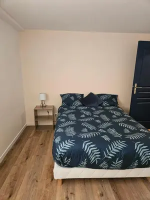 Un ou plusieurs lits dans un hébergement de l'établissement Maison spacieuse jardin Transat - Parking gratuit