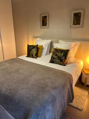 Un ou plusieurs lits dans un hébergement de l'établissement Niort Home