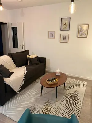 Coin salon dans l'établissement Niort Home