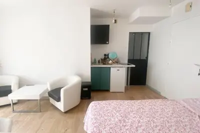 Un ou plusieurs lits dans un hébergement de l'établissement Appartement en face de la gare - centre ville
