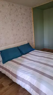 Un ou plusieurs lits dans un hébergement de l'établissement Chambre à la campagne