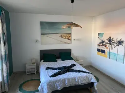 Un ou plusieurs lits dans un hébergement de l'établissement ღ Escale bleu - Extérieur, Baby foot & Wifi