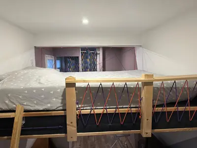 Un ou plusieurs lits dans un hébergement de l'établissement La Tiny : Adorable petit studio /parking gratuit.