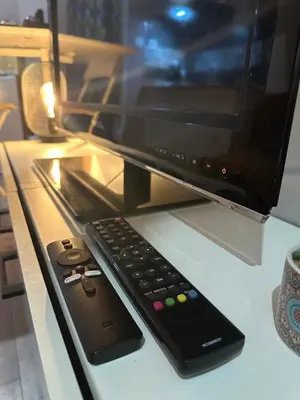 Télévision ou salle de divertissement dans l'établissement La Tiny : Adorable petit studio /parking gratuit.