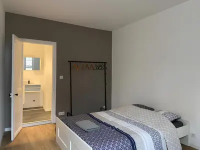 Un ou plusieurs lits dans un hébergement de l'établissement Magnifique appartement - Hyper centre Vieux Cognac