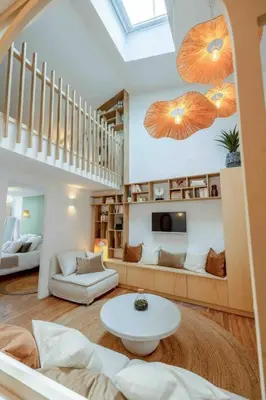 Coin salon dans l'établissement ღ Mezzanine • T4 Spacieux, Lumineux et Cosy