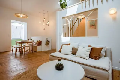 Coin salon dans l'établissement ღ Mezzanine • T4 Spacieux, Lumineux et Cosy