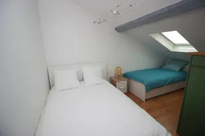 Un ou plusieurs lits dans un hébergement de l'établissement T3 cosy , cœur historique de La Rochelle
