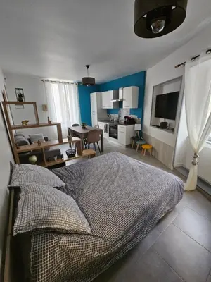 Télévision ou salle de divertissement dans l'établissement Sarl la famille 2