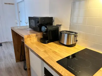 Cuisine ou kitchenette dans l'établissement LE PETIT NIORTAIS - Centre ville - WIFI - NETFLIX - AMAZON