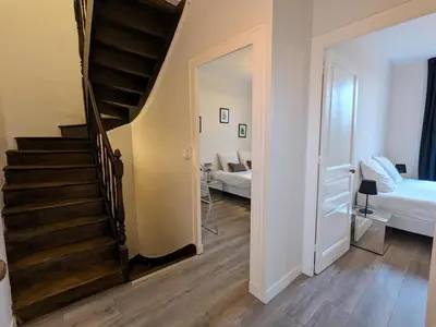 Plan de l'établissement Maison spacieuse avec terrasse, proche CNDBI, idéale pour familles et événements, animaux acceptés. - FR-1-653-249