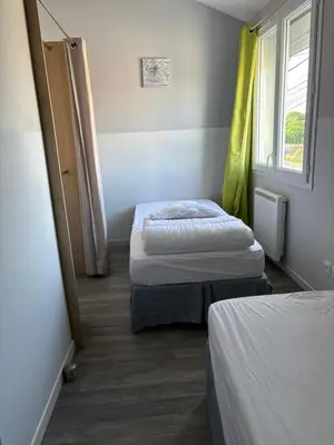 Un ou plusieurs lits dans un hébergement de l'établissement Le clos de Salles