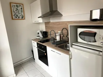 Cuisine ou kitchenette dans l'établissement Apt T2 calme cozy hyper centre - vieux port - gare