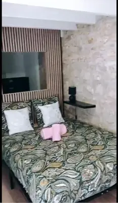 Un ou plusieurs lits dans un hébergement de l'établissement Cosy Bellamy
