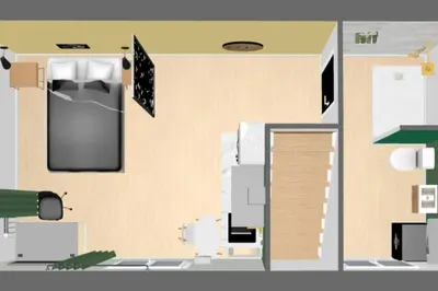 Cuisine ou kitchenette dans l'établissement MAISON LA FEUILLERAIE-8 personnes-standing Appart