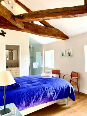 Un ou plusieurs lits dans un hébergement de l'établissement Aux Agapanthes, Chambres d'Hôtes charentaises de charme avec piscine