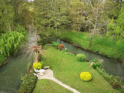 Jardin de l'établissement Ancien moulin rustique avec jardin, WIFI et parking, animaux acceptés - FR-1-653-251