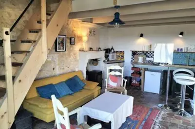 Cuisine ou kitchenette dans l'établissement La Chabourne des remparts