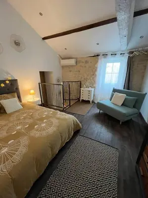Un ou plusieurs lits dans un hébergement de l'établissement La Petite Maison - La Grange des Colporteurs