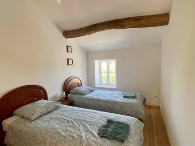 Un ou plusieurs lits dans un hébergement de l'établissement La Maison Saint Pierre, Aulnay