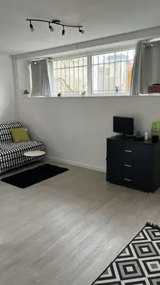 Un ou plusieurs lits dans un hébergement de l'établissement Studio proche du centre-ville