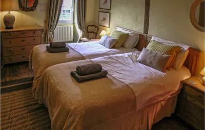 Un ou plusieurs lits dans un hébergement de l'établissement Amazing Home In Suaux
