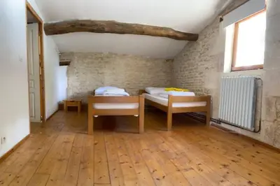 Un ou plusieurs lits dans un hébergement de l'établissement Gîte au cœur du Marais mouillé (2 à 4 pers - 60m²)