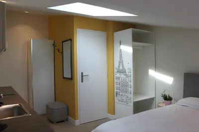 Un ou plusieurs lits dans un hébergement de l'établissement Maison Meire Studios