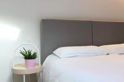 Un ou plusieurs lits dans un hébergement de l'établissement Maison Meire Studios