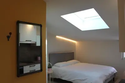 Un ou plusieurs lits dans un hébergement de l'établissement Maison Meire Studios