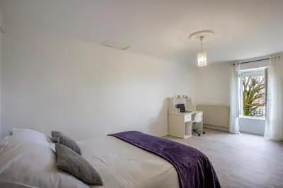 Un ou plusieurs lits dans un hébergement de l'établissement L'escapade Vendéenne - Grand jardin 4 chambres