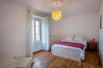 Un ou plusieurs lits dans un hébergement de l'établissement L'escapade Vendéenne - Grand jardin 4 chambres