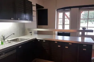 Cuisine ou kitchenette dans l'établissement Gîte du Louvanto