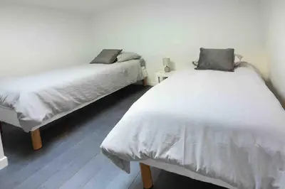 Un ou plusieurs lits dans un hébergement de l'établissement La Petite Croisée - extérieur et plage
