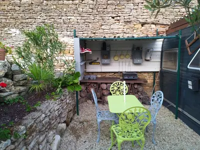 Cuisine ou kitchenette dans l'établissement Le paradis caché