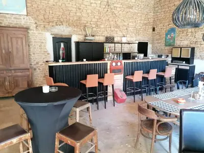 Coin salon dans l'établissement Pays de Joie - Caravan La Bohème