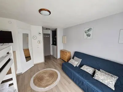 Télévision ou salle de divertissement dans l'établissement Appartement au cœur du Futuroscope